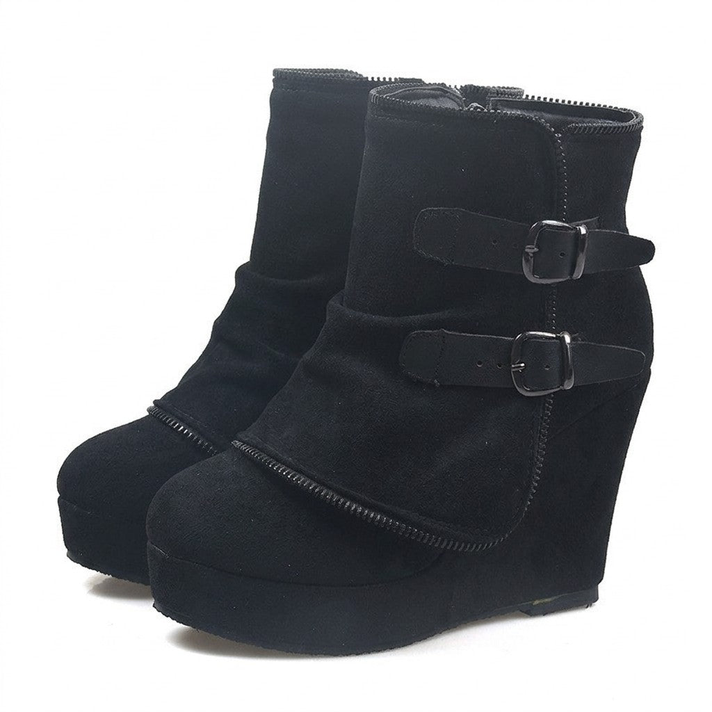 Pair of black Saskia suede wedge ankle boots on white with fold-over zip-trimmed panel