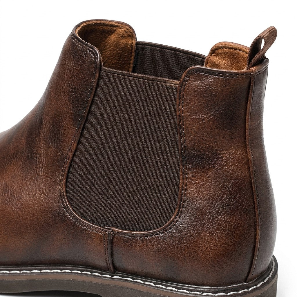 Close-up of the Falk elastic gusset, heel pull tab and brushed lining