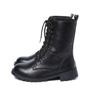 Pair of black Lysandra leather lace up boots with lug soles, side view on white