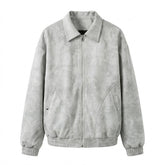 Emeric men's suede blouson jacket in grey, front view on white with point collar and curved pocket seams