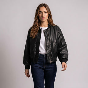 Model walking in the Aurelia bomber, showing the zip and stitched storm flap