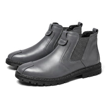 Pair of grey Henrik leather Chelsea boots on white with heathered elastic gusset