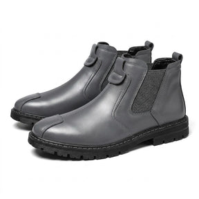 Pair of grey Henrik leather Chelsea boots on white with heathered elastic gusset