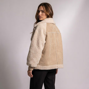 Back view of the Beige Fenna jacket with suede back panel and full shearling sleeves