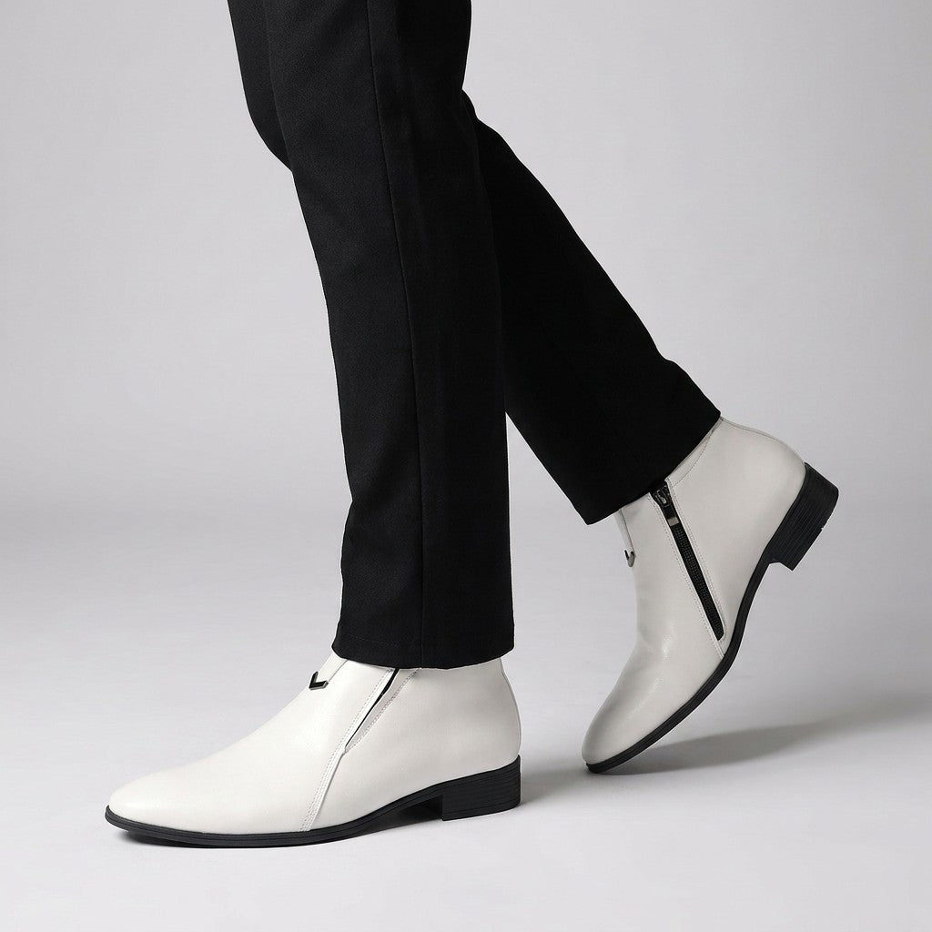 White Ivo dress boots worn with slim black trousers, walking side view