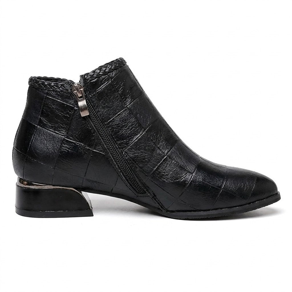 Inner side of the black Tamsin ankle boot on white with diagonal side zip