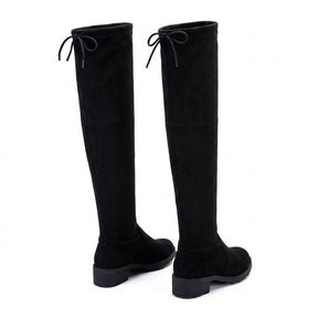 Oriane black suede over-the-knee boots from behind on white, back drawstrings and seams