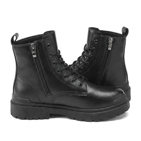 Inner side of the Matthis boots showing the vertical side zip and silver puller
