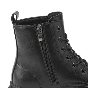 Close-up of the Matthis side zip, metal eyelets and padded collar
