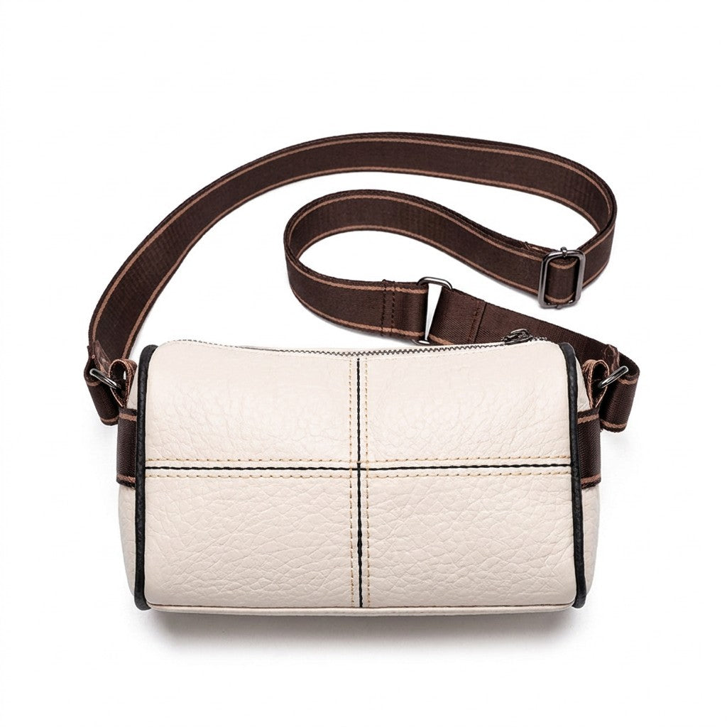 Ivory cream Bellamy leather barrel bag with black piping and wide striped webbing strap