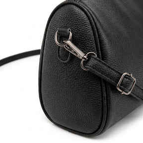 Close-up of the gunmetal swivel clasp and strap buckle on the side of the Odalys