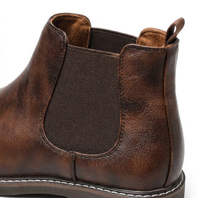 Close-up of the Falk elastic gusset, heel pull tab and brushed lining